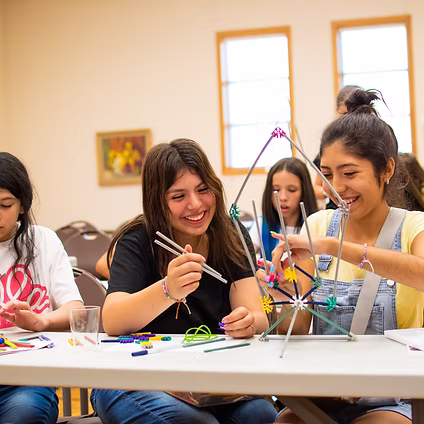 Students engaged in STEAM activities